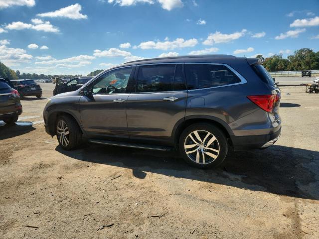 Photo 2 from auction – 2017 HONDA PILOT TOUR with VIN 5FNYF5H95HB016337