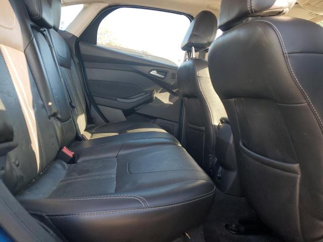 Photo 10 from auction – 2014 FORD FOCUS TITA with VIN 1FADP3J2XEL276390