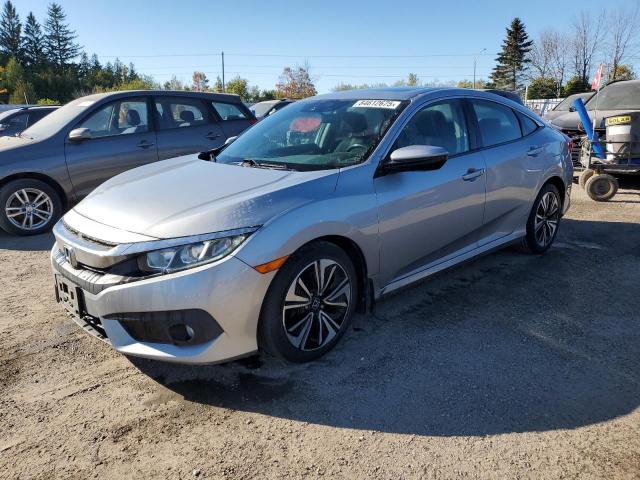 HONDA CIVIC EX 2016 with VIN 2HGFC1F46GH100077 - Photo from auction