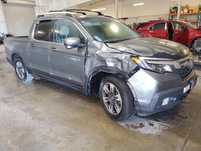 Photo 4 from auction – 2017 HONDA RIDGELINE with VIN 5FPYK2F63HB011700