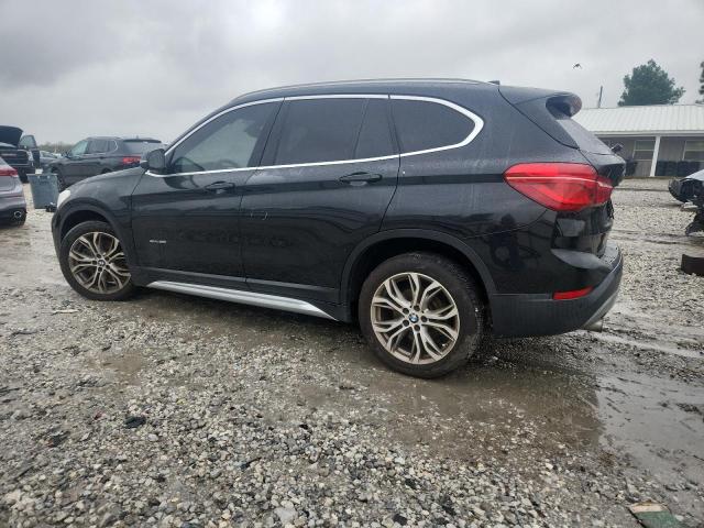 Photo 2 from auction – 2017 BMW X1 XDRIVE2 with VIN WBXHT3C3XH5F70691