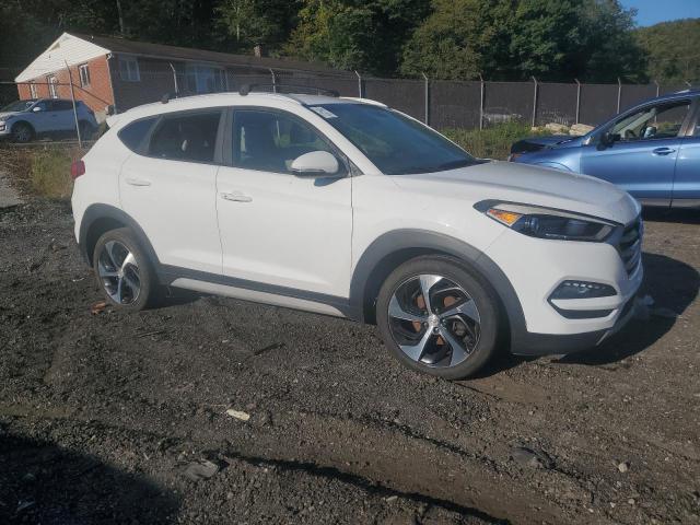 Photo 4 from auction – 2017 HYUNDAI TUCSON LIM with VIN KM8J3CA25HU404960