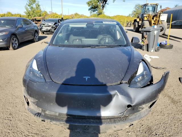 Photo 5 from auction – 2023 TESLA MODEL 3 with VIN LRW3E1FA9PC920932