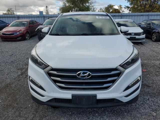 Photo 5 from auction – 2017 HYUNDAI TUCSON SE with VIN KM8J2CA47HU559613