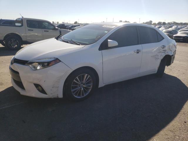 TOYOTA COROLLA L 2015 with VIN 2T1BURHE0FC290966 - Photo from auction