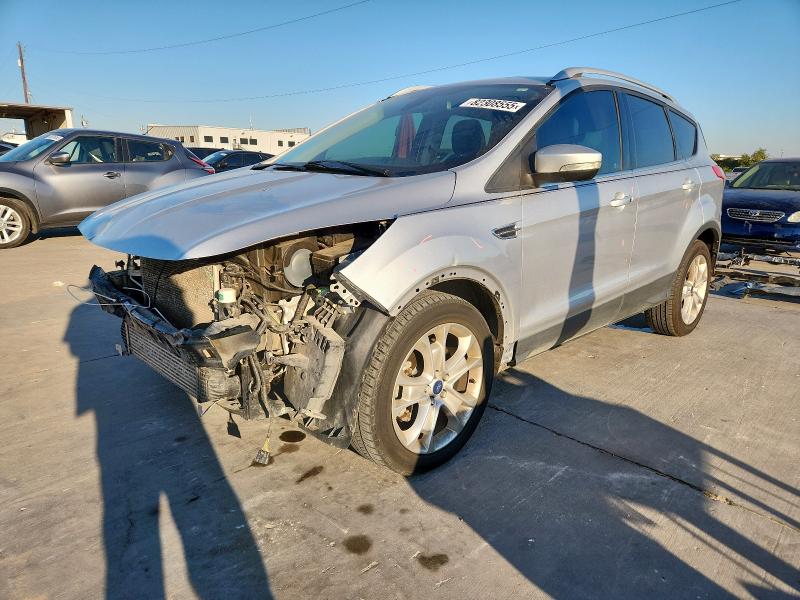 FORD ESCAPE TIT 2014 with VIN 1FMCU0J90EUA37737 - Photo from auction