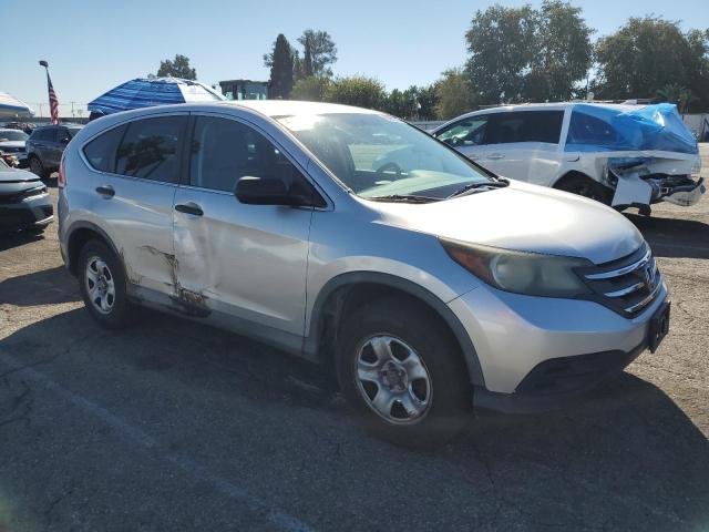 Photo 4 from auction – 2014 HONDA CR-V LX with VIN 2HKRM3H33EH548872