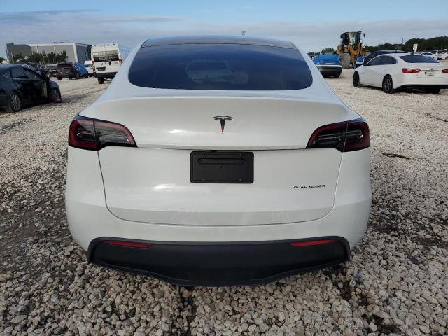 Photo 6 from auction – 2023 TESLA MODEL Y with VIN 7SAYGDEEXPF782154