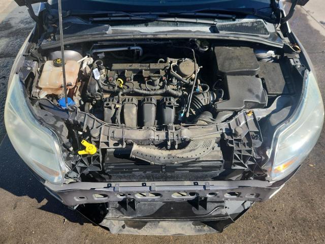 Photo 11 from auction – 2013 FORD FOCUS S with VIN 1FADP3E23DL374024