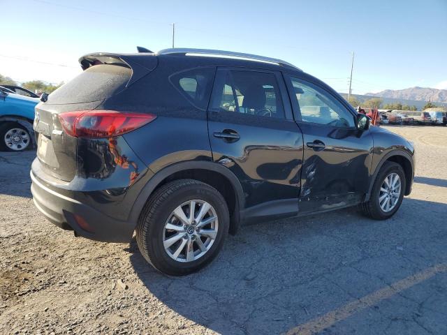 Photo 3 from auction – 2016 MAZDA CX-5 TOURI with VIN JM3KE4CYXG0881875