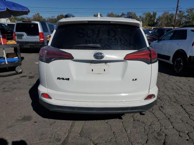 Photo 6 from auction – 2017 TOYOTA RAV4 LE with VIN 2T3ZFREV5HW372634