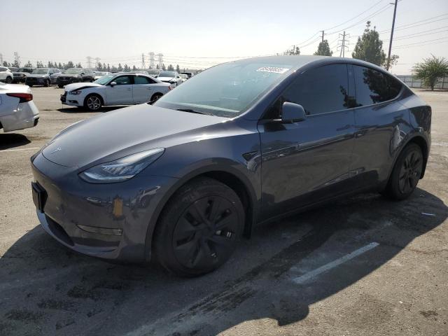 TESLA MODEL Y 2023 with VIN 7SAYGDEE0PA085234 - Photo from auction
