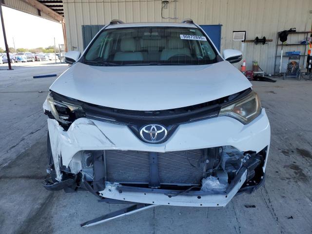 Photo 5 from auction – 2016 TOYOTA RAV4 XLE with VIN JTMWFREV7GJ091970