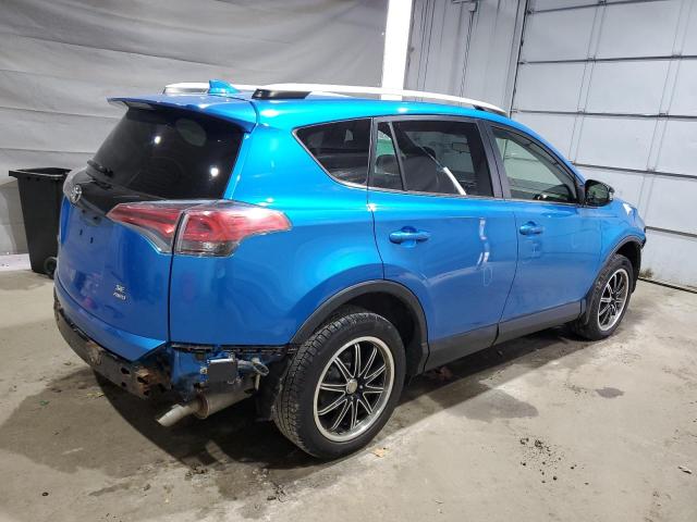 Photo 3 from auction – 2016 TOYOTA RAV4 SE with VIN JTMJFREV9GD177435