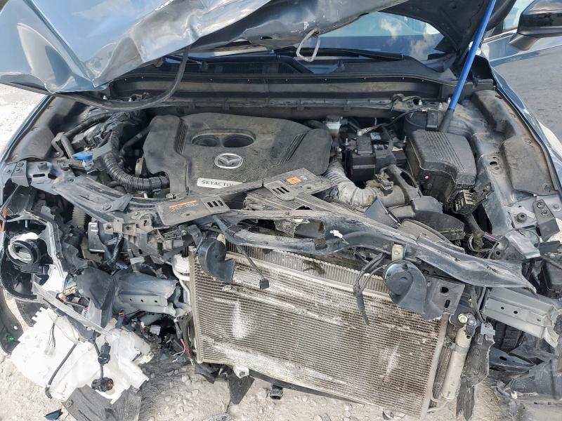 Photo 12 from auction – 2021 MAZDA CX-5 TOURI with VIN JM3KFACYXM0333902