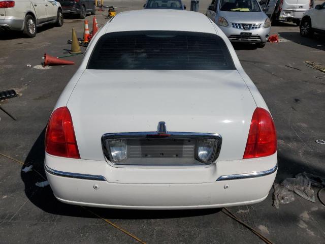 Photo 6 from auction – 2004 LINCOLN TOWN CAR E with VIN 1LNHM81W14Y633747