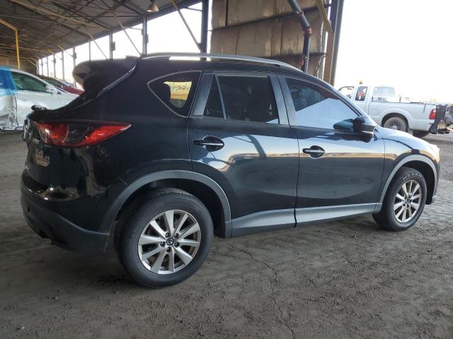 Photo 3 from auction – 2014 MAZDA CX-5 TOURI with VIN JM3KE2CY6E0419735