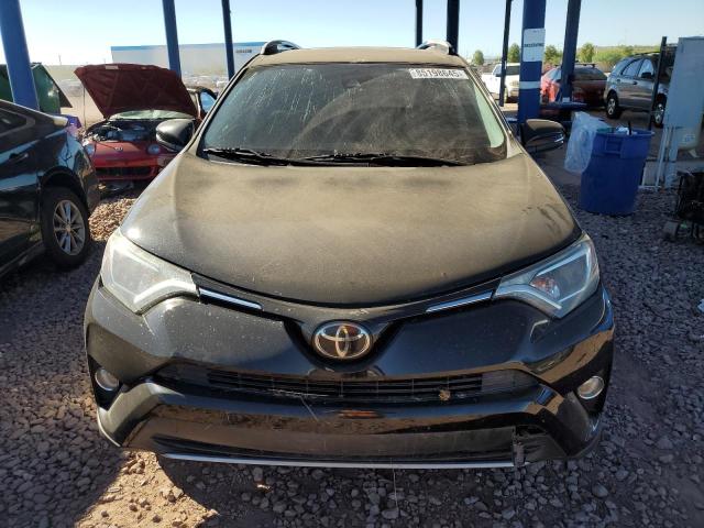Photo 5 from auction – 2017 TOYOTA RAV4 XLE with VIN 2T3WFREV9HW399886