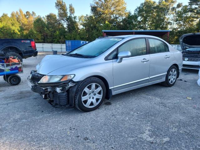 HONDA CIVIC LX 2011 with VIN 19XFA1F53BE034587 - Photo from auction