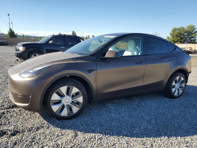 TESLA MODEL Y 2023 with VIN 7SAYGAEE3PF900642 - Photo from auction