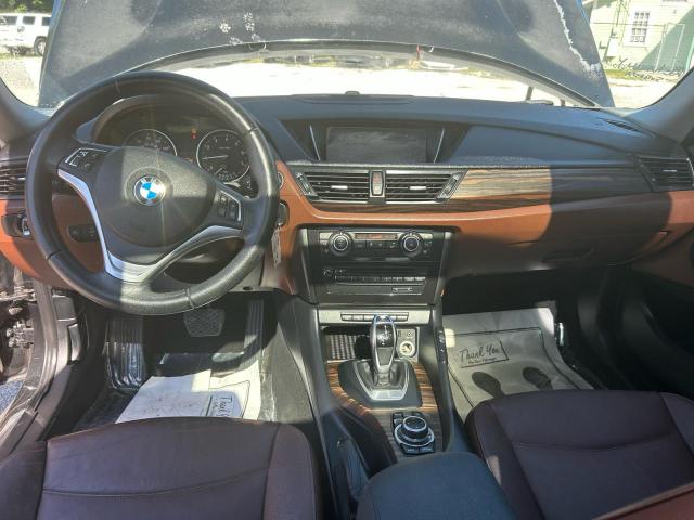 Photo 9 from auction – 2014 BMW X1 SDRIVE2 with VIN WBAVM1C59EVW54283