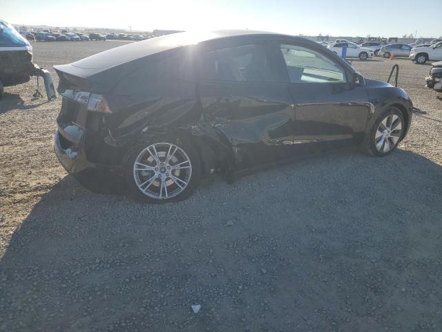 Photo 3 from auction – 2023 TESLA MODEL Y with VIN 7SAYGAEE8PF873194