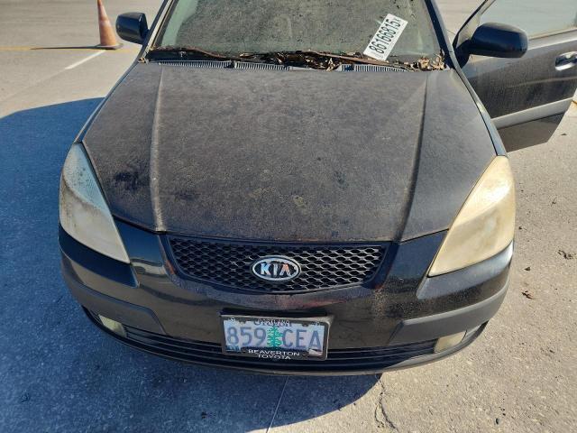 Photo 11 from auction – 2006 KIA RIO with VIN KNADE163366060271