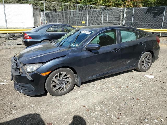 Photo 1 from auction – 2018 HONDA CIVIC EX with VIN 2HGFC2F74JH569711