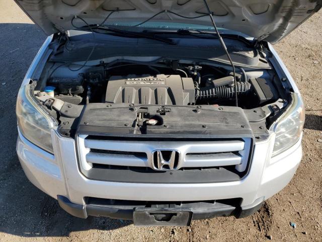 Photo 11 from auction – 2006 HONDA PILOT EX with VIN 5FNYF18546B026098
