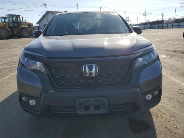 Photo 5 from auction – 2021 HONDA PASSPORT E with VIN 5FNYF8H58MB026336
