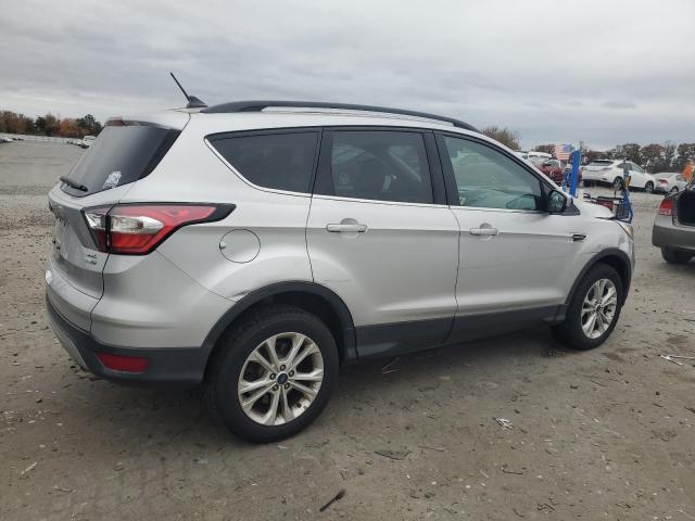 Photo 3 from auction – 2018 FORD ESCAPE SEL with VIN 1FMCU9HD7JUA02296