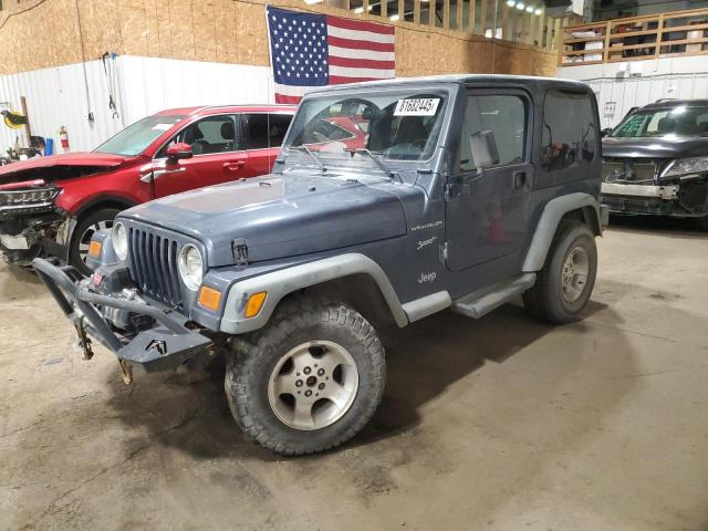 JEEP WRANGLER / 2002 with VIN 1J4FA49S02P731924 - Photo from auction