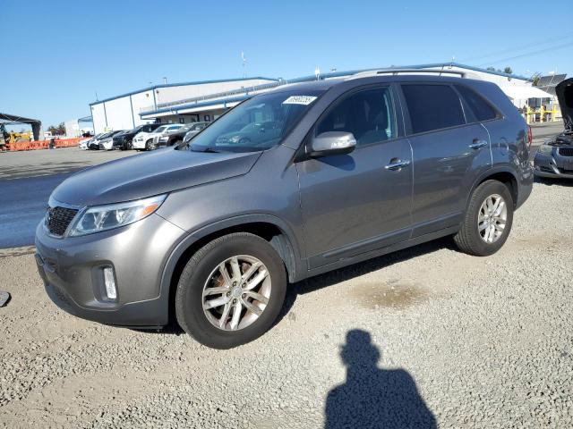 KIA SORENTO LX 2015 with VIN 5XYKT4A64FG627779 - Photo from auction