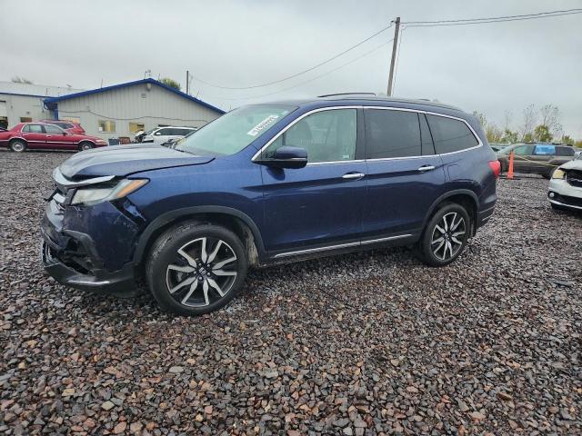HONDA PILOT TOUR 2021 with VIN 5FNYF6H66MB017700 - Photo from auction