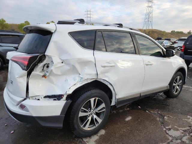 Photo 3 from auction – 2017 TOYOTA RAV4 XLE with VIN JTMRFREV7HD200876