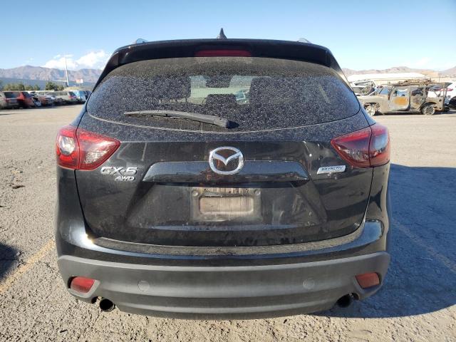 Photo 6 from auction – 2016 MAZDA CX-5 TOURI with VIN JM3KE4CYXG0881875