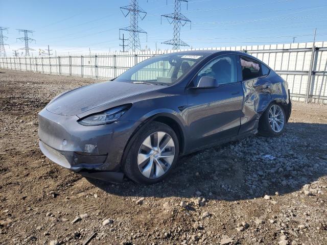 TESLA MODEL Y 2023 with VIN 7SAYGDEE1PA155517 - Photo from auction
