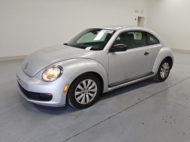 VOLKSWAGEN BEETLE 2014 with VIN 3VWFP7AT9EM620693 - Photo from auction