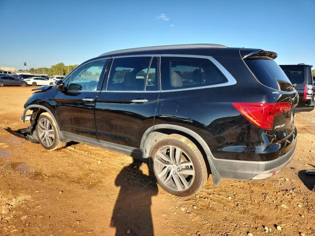 Photo 2 from auction – 2017 HONDA PILOT TOUR with VIN 5FNYF6H94HB064806