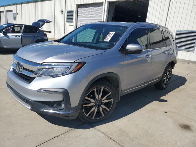 HONDA PILOT ELIT 2021 with VIN 5FNYF6H01MB053810 - Photo from auction