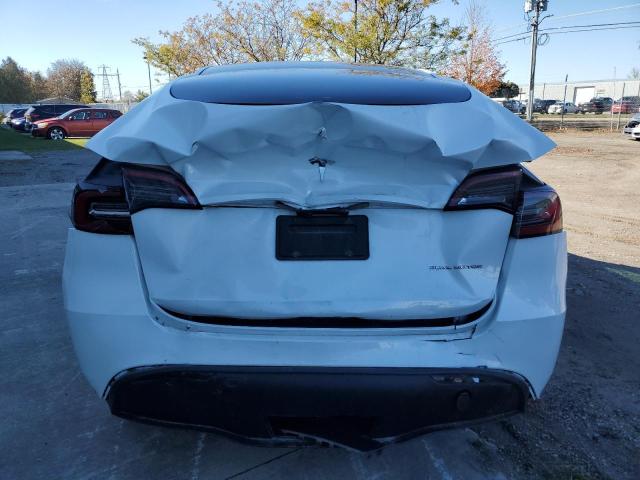 Photo 6 from auction – 2023 TESLA MODEL Y with VIN LRWYGDEE0PC081002
