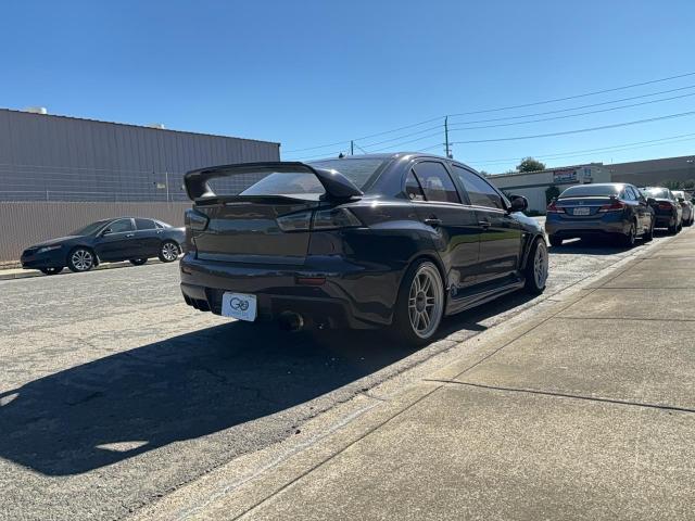 Photo 4 from auction – 2013 MITSUBISHI LANCER EVO with VIN JA32W8FV1DU024118