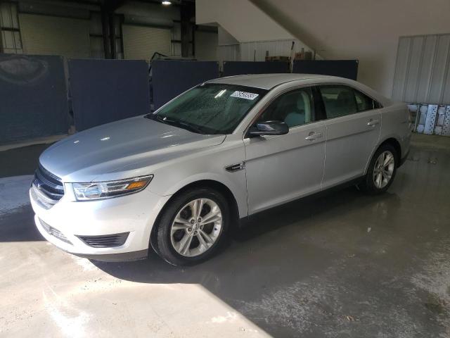 FORD TAURUS SE 2015 with VIN 1FAHP2D85FG203501 - Photo from auction