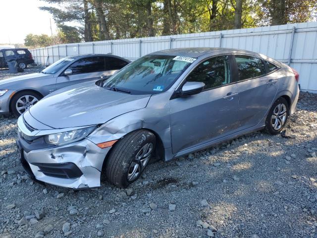 HONDA CIVIC LX 2018 with VIN 2HGFC2F52JH554266 - Photo from auction