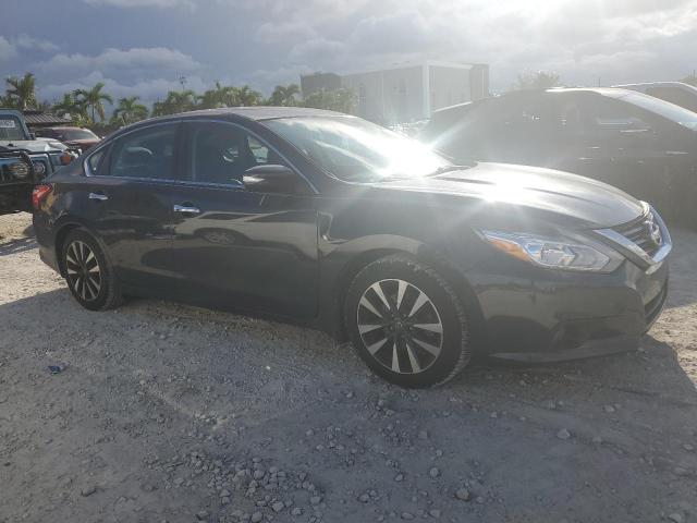 Photo 4 from auction – 2016 NISSAN ALTIMA 2.5 with VIN 1N4AL3AP9GC189285