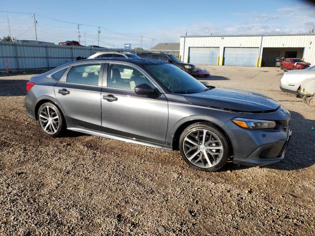 Photo 4 from auction – 2024 HONDA CIVIC TOUR with VIN 2HGFE1F99RH312271