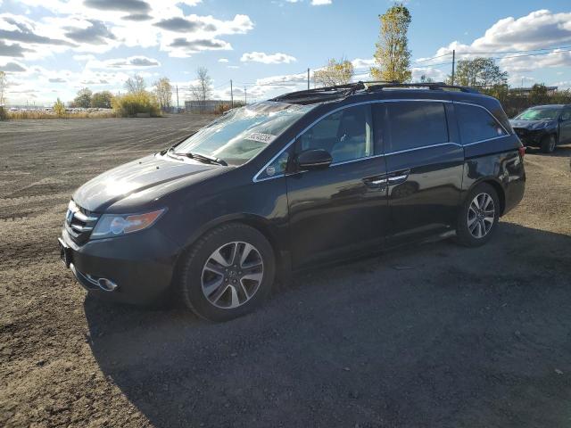 HONDA ODYSSEY TO 2014 with VIN 5FNRL5H92EB509367 - Photo from auction