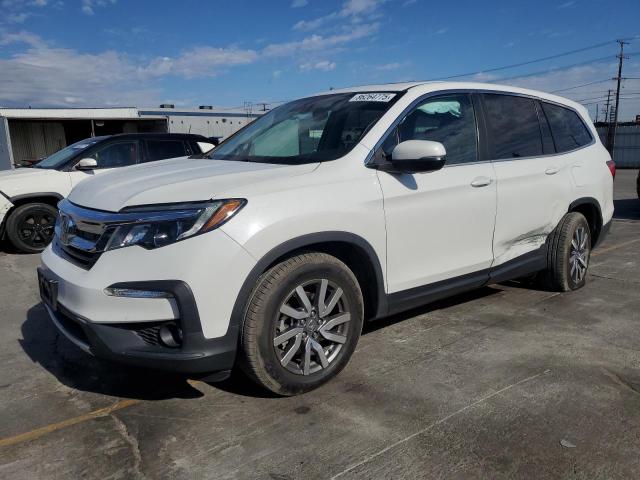 HONDA PILOT EXL 2021 with VIN 5FNYF5H51MB026872 - Photo from auction