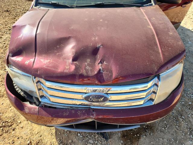 Photo 12 from auction – 2008 FORD TAURUS X S with VIN 1FMDK02W58GA20465