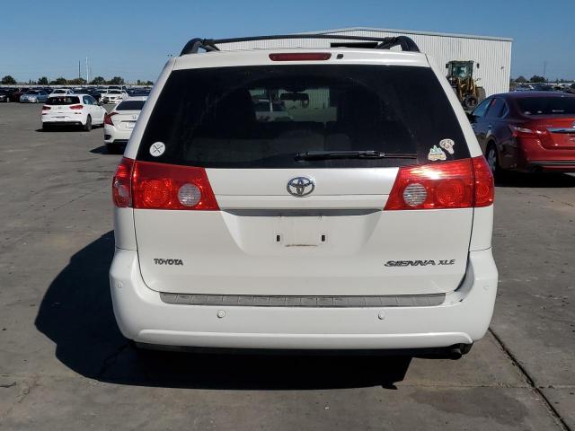 Photo 6 from auction – 2010 TOYOTA SIENNA XLE with VIN 5TDYK4CC3AS310667